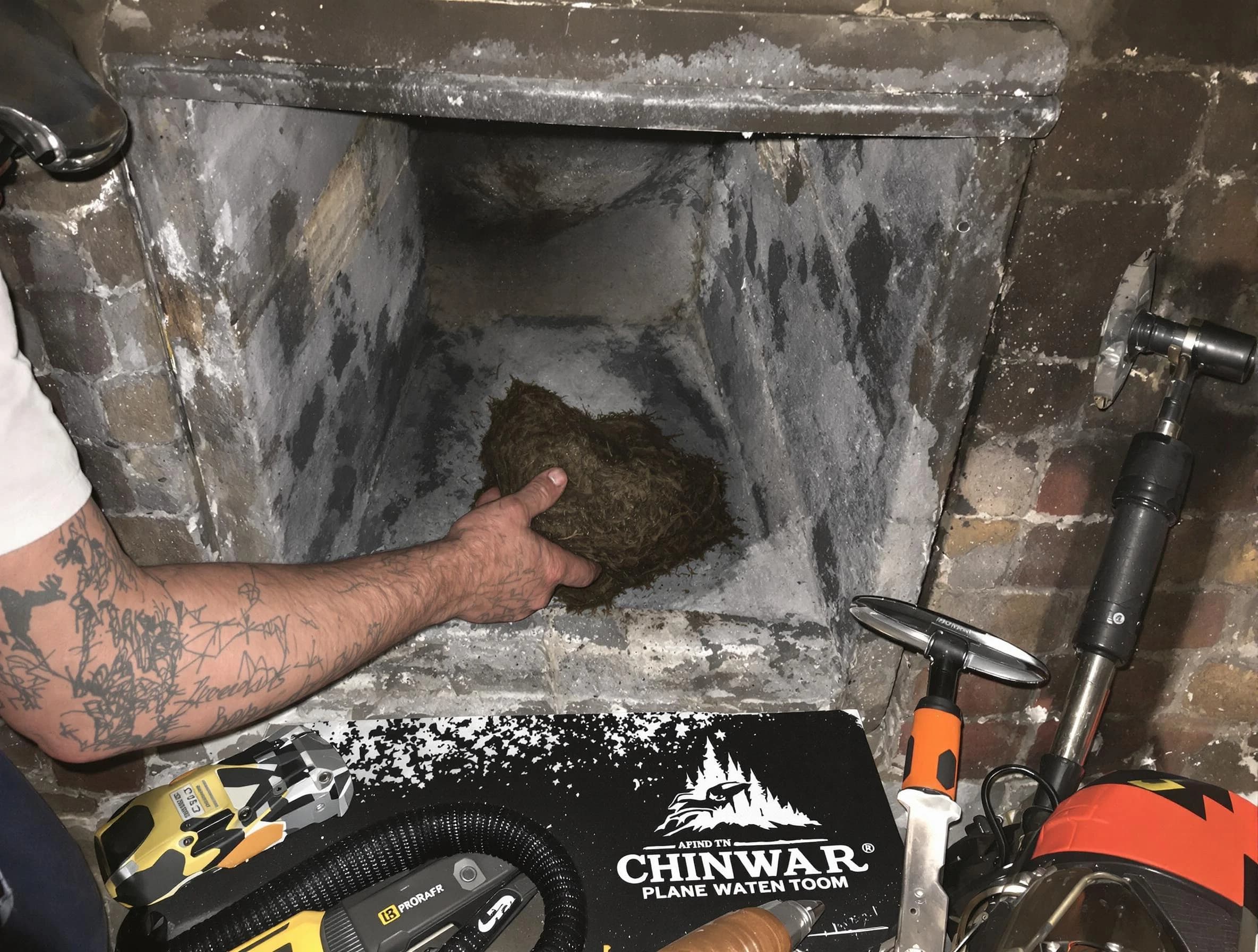 Attleboro Chimney Sweep safely removing debris and screening chimney in Attleboro, MA
