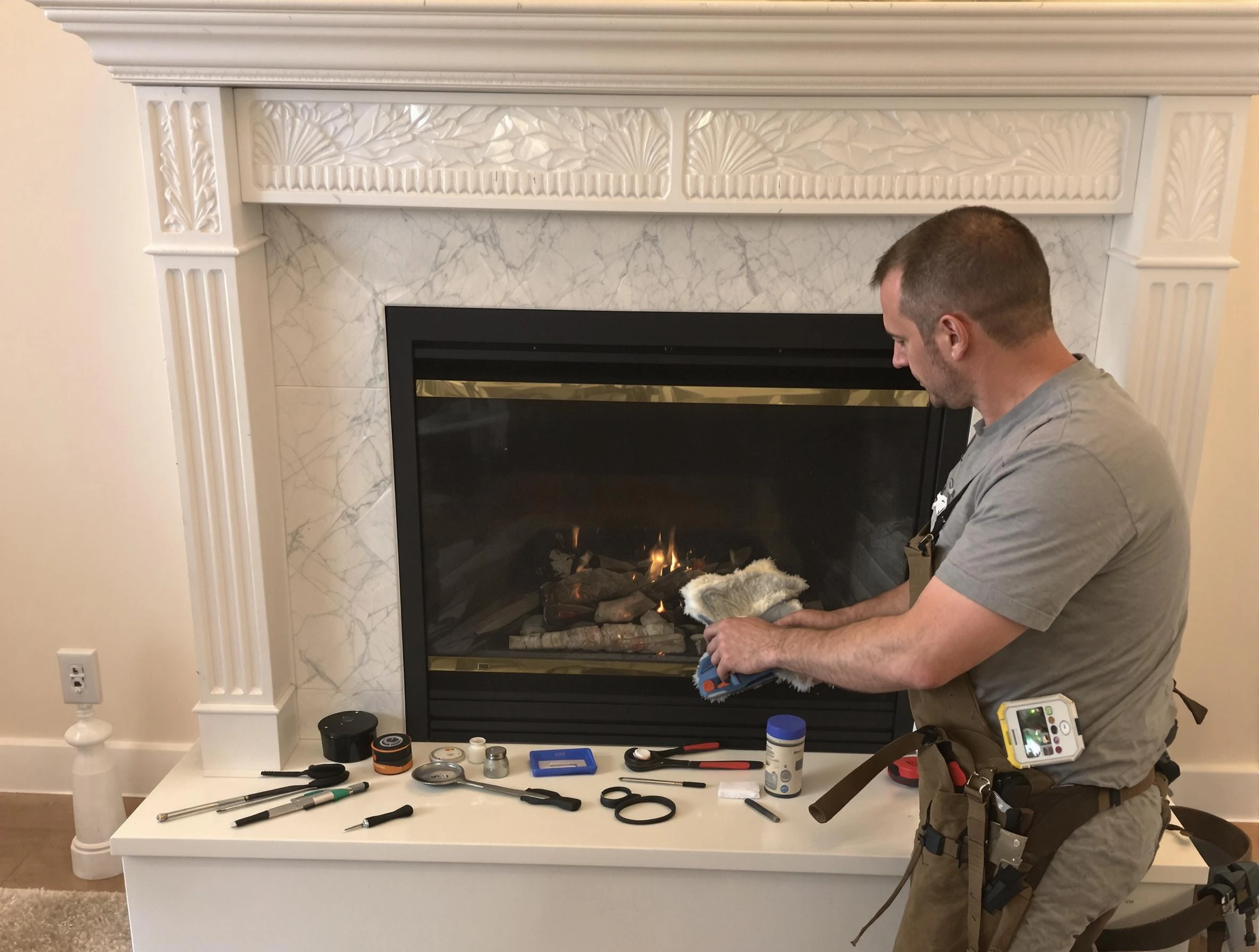 Attleboro Chimney Sweep performing fireplace maintenance in Attleboro, MA